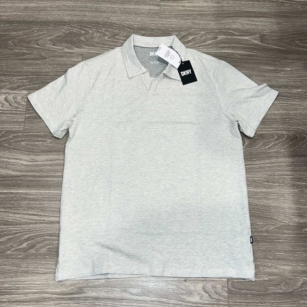 DKNY polo. Size L. NWT